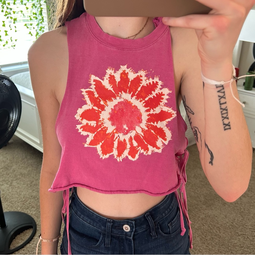 Cute cropped tank, open sides with ties on the bottom